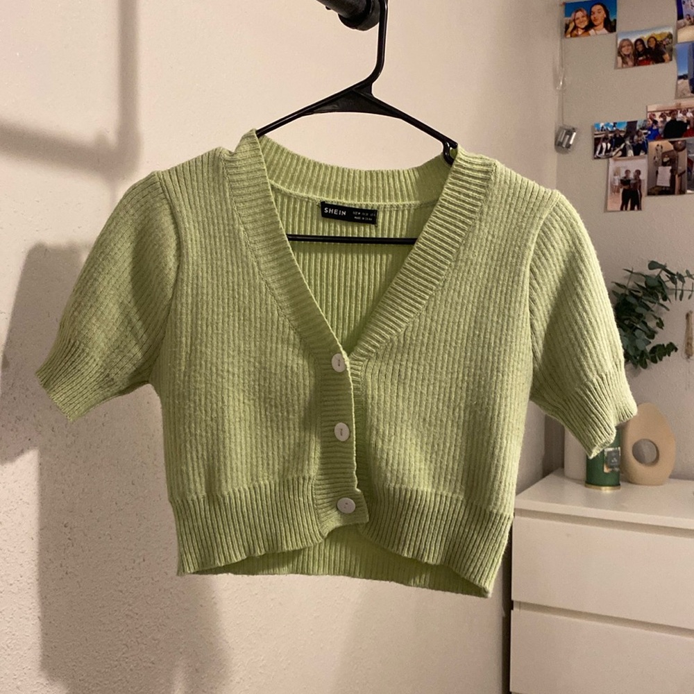 sage green button up top. lightly worn, not damaged.